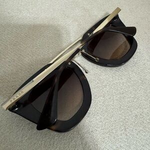 Brown tortoise Prada sunglasses